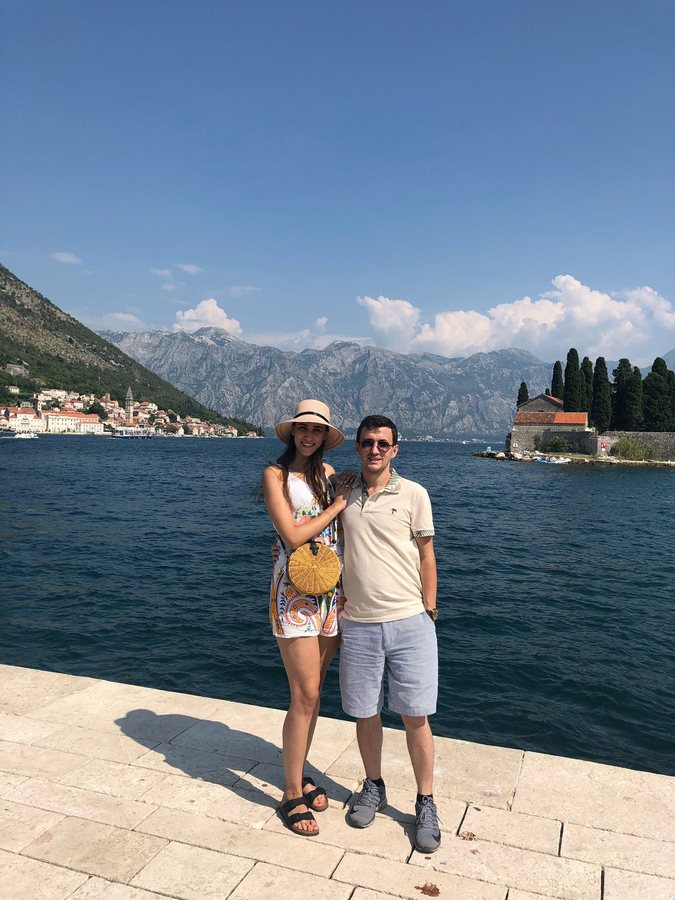Levent Kutlu and his spouse beside the Bay of Kotor waterfront