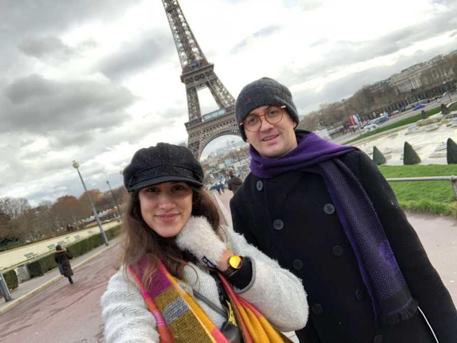 Levent Kutlu and his spouse near the Eiffel Tower in Paris