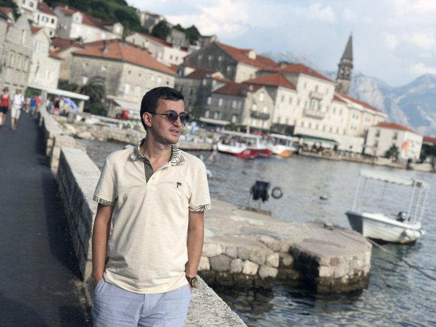 Levent Kutlu on the waterfront of a historic Adriatic coastal town